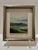 A refined vintage landscape oil painting featuring softly layered hills, water, and sky rendered in muted, atmospheric...