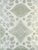 A refined medallion pattern drawn in delicate lines and printed in five soft, harmonious colors on a beautiful off-white...