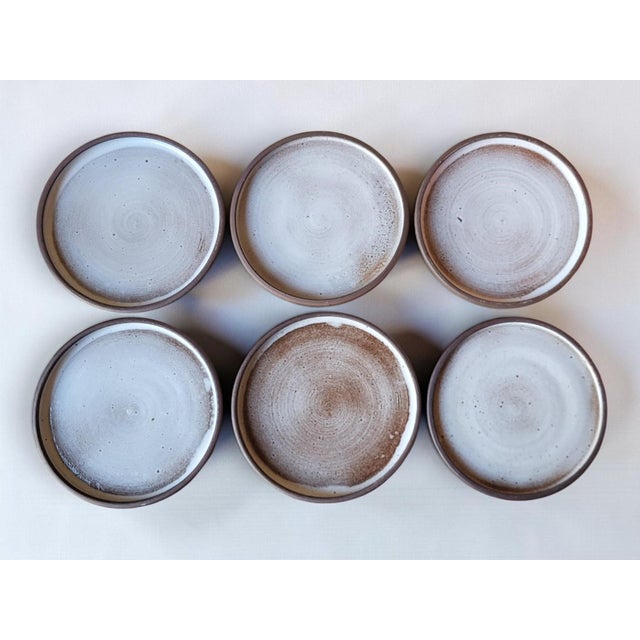 Six stoneware plates from Ratilly / J&N Pierlot / Puisaye Norbert Pierlot (1919–1979): French actor and ceramicist, born...