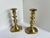 An exceptional pair of antique brass candlestick holders dates to the mid-to-late 19th century. Featuring a classic...