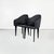 Set of 4 chairs mod. Toscana with square seat in black synthetic leather. The back, which extends on two sides, has a...