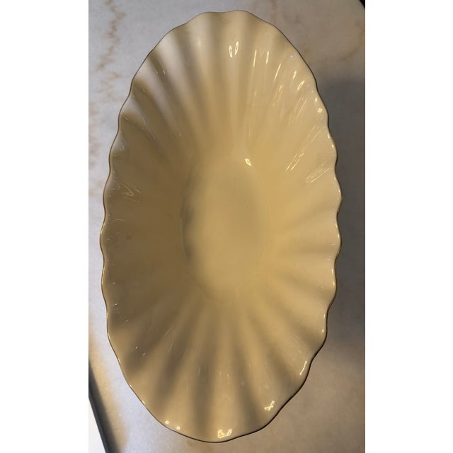 Lenox Aquarius dolphin pedestal centerpiece bowl. Ivory porcelain, shell form, 24K gold trim. Original foil label. 12"W x...