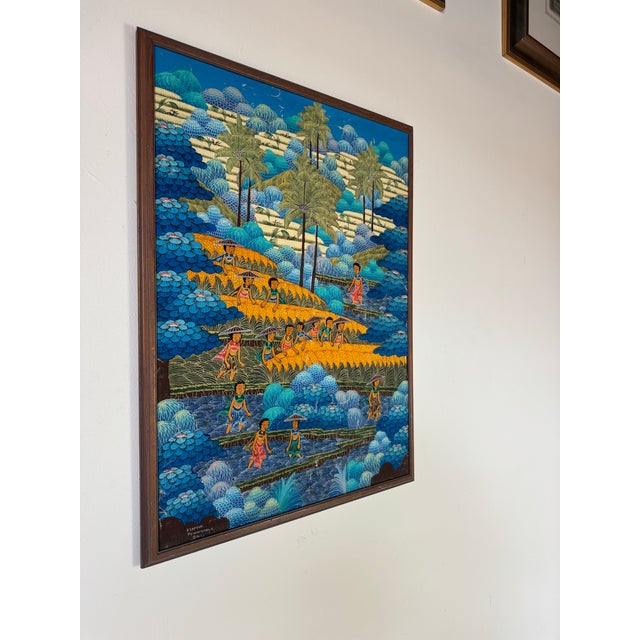 A vibrant and intricately detailed vintage oil on canvas painting from the 1970s, signed by Y. Lepyoo of Penestanan Kelod,...