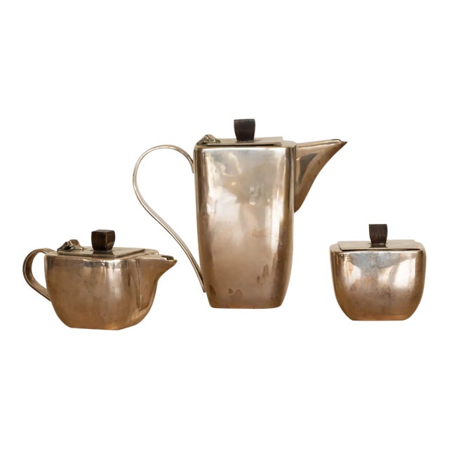 Unique Art Deco silver plate tea set made from France, 1930s. Heavy silver plate with wood handle detail. Set includes 1x...