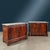 Pair of sideboards veneered in mahogany feather, resting on feet of which the front ones have a circular plinth,...