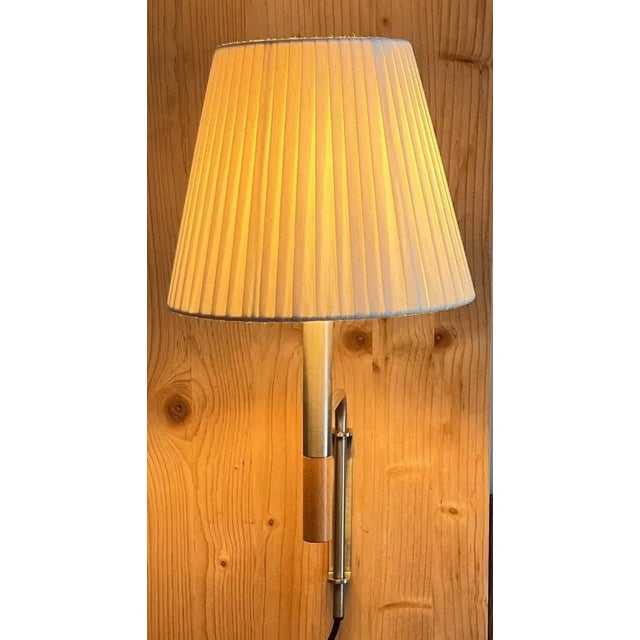 Natural bc1 wall lamp by santa & cole dimensions: d 20 x w 35 x h 44 cm materials: metal, beech wood, ribbon. the bc1 wall...