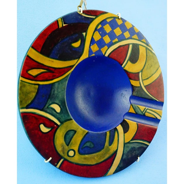 MEASUREMENTS: Diameter: 24.5 cm; Depth: 4.5 cm; Weight: 0.940 kg Item : A magnificent terracotta cigar ashtray, entirely...