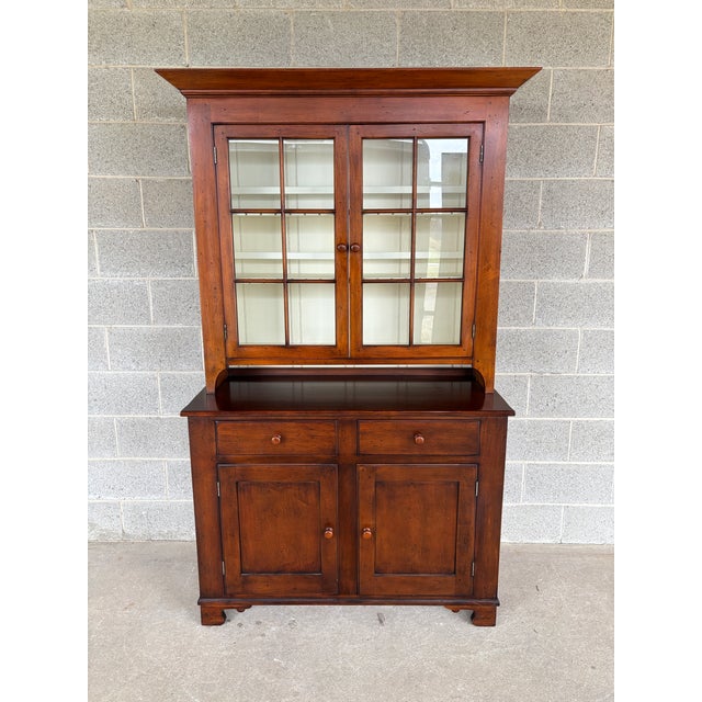 Description: Kindel Chimney Hill Shaker Style Cherry 2 Piece Dutch Cupboard. High Quality Craftsmanship, In Very Good...
