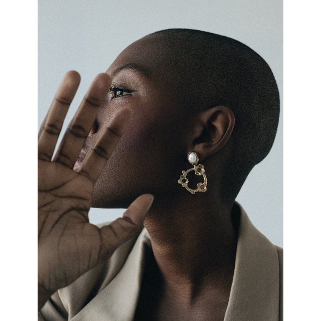 The Carmine Earrings are a favorite this season! Hand-carved from wax, the wreath of flowers hangs easily and is almost...