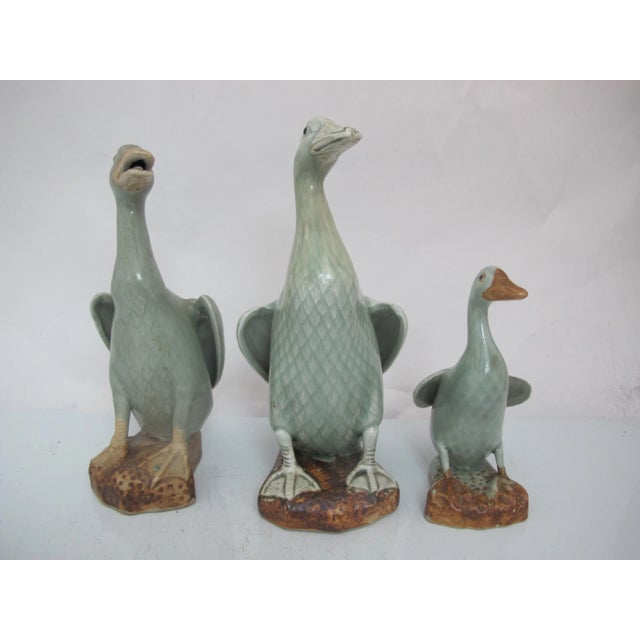 Set of 3 Chinese celadon glazed porcelain geese. Each is in excellent condition. The smallest has some rough edges on the...