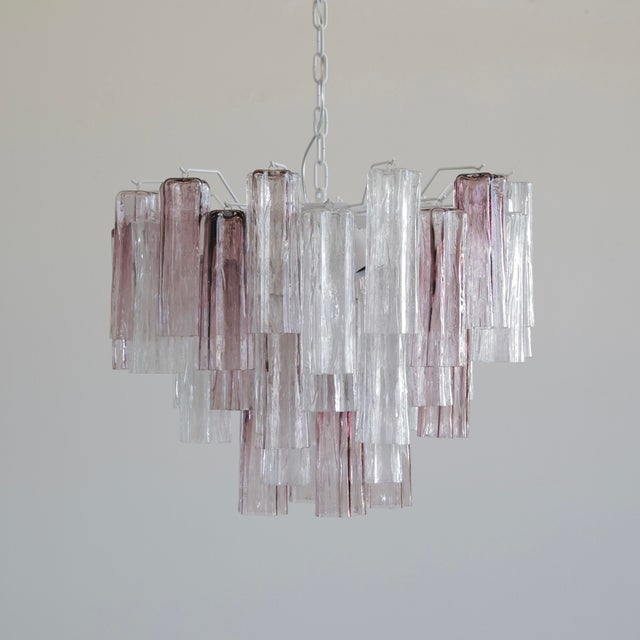 Chandelier with star-shaped 'Tronchi' glass pieces, Murano, Italy. Large chandelier with white painted metal structure,...