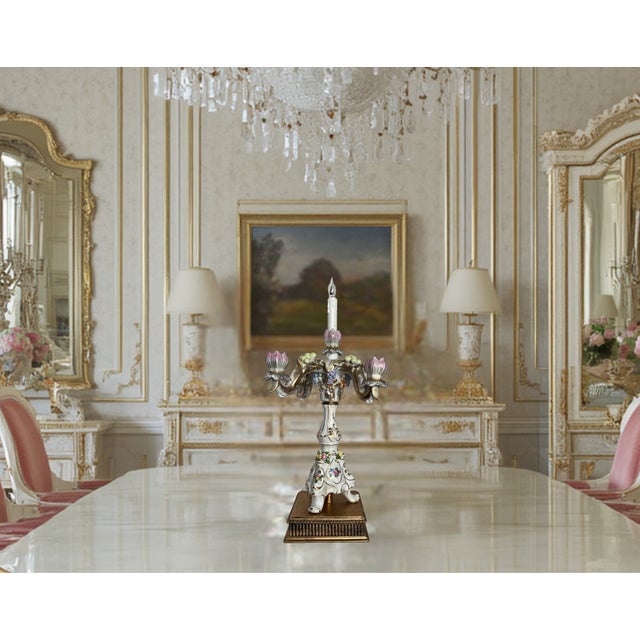 This elegant Dresden porcelain candelabra conversion lamp was created using an ornately decorated four-arm porcelain...