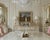 This elegant Dresden porcelain candelabra conversion lamp was created using an ornately decorated four-arm porcelain...