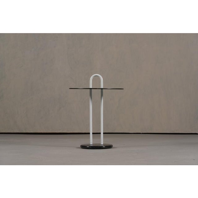 A rare vintage Italian coffee table designed by Vico Magistretti for Cattelan Italia in the 1980's. This small, round...