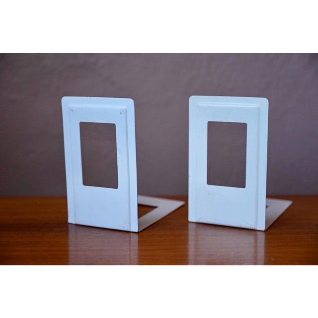 With their minimalist and clean lines, these vintage 1960s bookends are sure to make a statement on your bookshelf or...