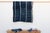 A masterwork of Malian textile heritage featuring deep indigo saturation and symbolic geometric motifs. Originating from...