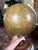 A J. Weld Terrestrial Globe. In good to fair condition. There is a slight wobble to the globe as it rests in its holder....