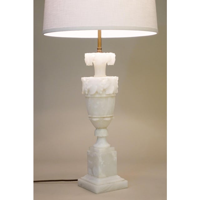 A sophisticated and elegant milky White Alabaster Marble & Brass Neoclassical Urn table lamp designed and manufactured in...