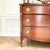 This stunning bow front Federal Revival mahogany chest features a rich mahogany grain, reeded corner posts, original...