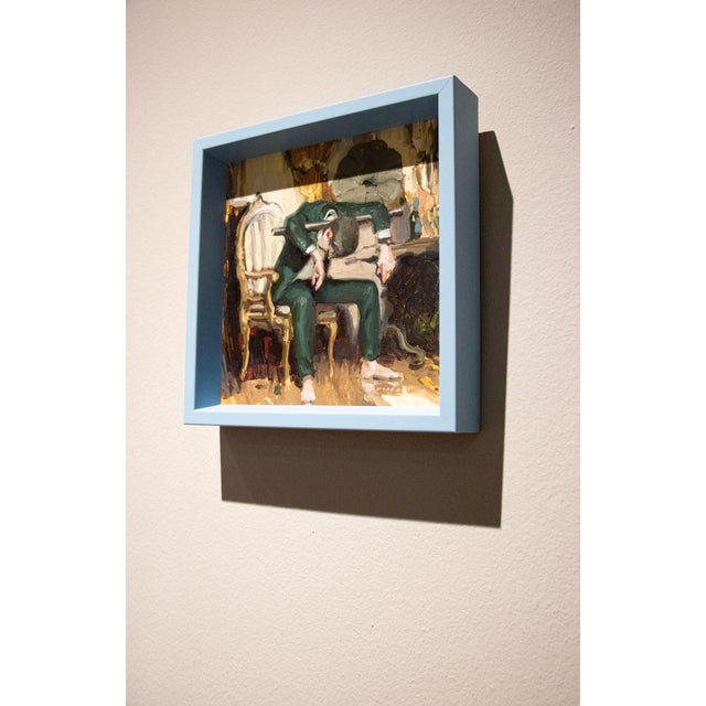 Something in the Way by Nadezda | Oil on panel of a man slumped in a chair with a gramophone nearby For Sale - Image 4 of 5