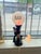 This playful mid-century novelty bar lamp features a glossy black ceramic base molded into the figure of a tipsy man in a...