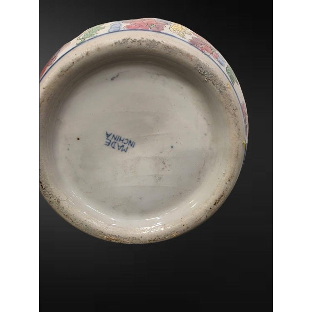 20th century, blue printed MADE IN CHINA mark A charming ovoid ginger jar and shallow domed cover, decorated overall in...