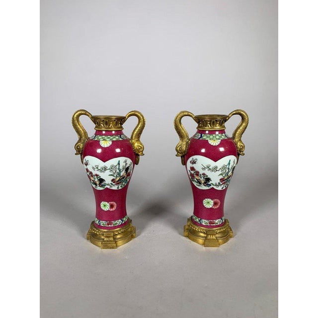 Pair of Chinese porcelain vases, Qianlong period, 18th century. Brought to France during the reign of Louis XV, they were...