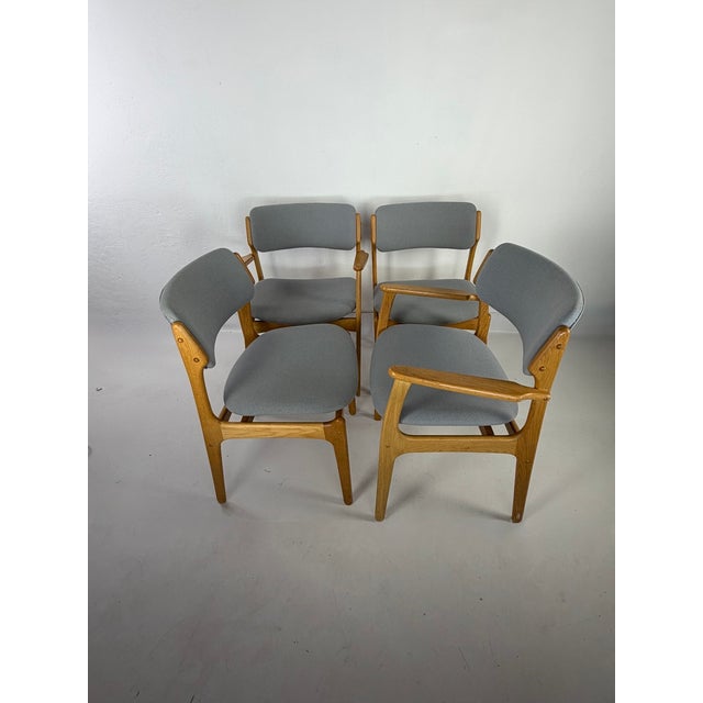 Original set of five chairs designed by Erik Buch, one of the most highly regarded Danish designers of the Mid-Century...