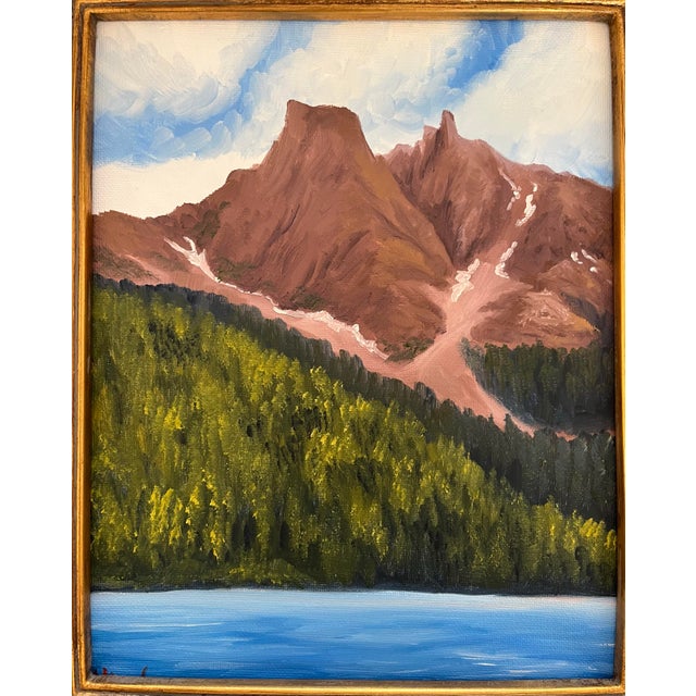 A view of John Muir Butte with trees and lake. Titled “the Mountains we conquered ”Oil on canvas 8 x 10 presented in a...