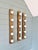 Trio of large wall sconces in solid brushed brass (bronze finish), 1970s-80s. each sconce has five light points. The...