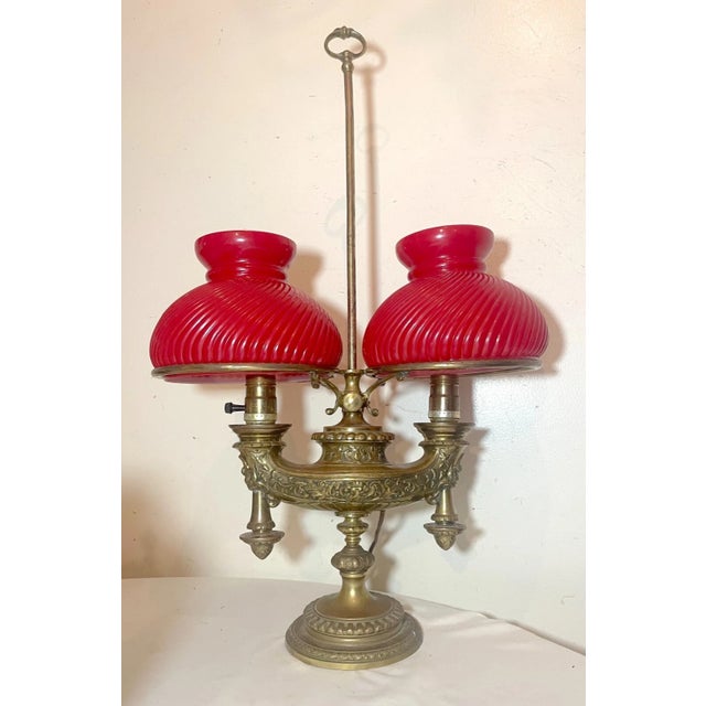 Up for sale is a high quality antique ornate solid bronze double Harvard desk lamp. It is cast out of solid bronze with...