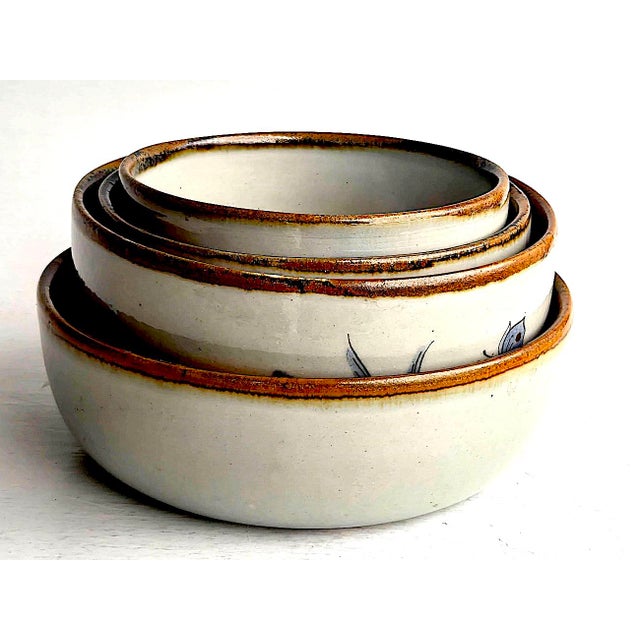 Offered is a set of 4 pieces of vintage (circa late 1970s through the early 1980s) burnished ceramic dinnerware from...