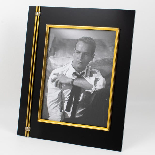 This stunning modernist picture frame was designed by the renowned Italian designer Tommaso Barbi. The rare piece was...