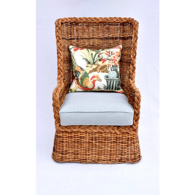 Scarcely seen vintage braided wicker rattan wingback chair & ottoman set with new custom cushions embellished with vintage...