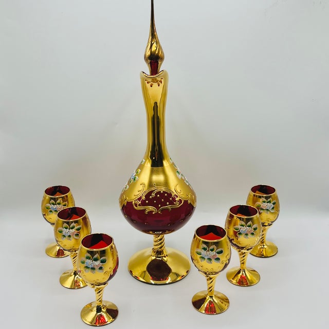 Mouth-blown venetian glass with 24k gold leaf & 3d enamel florals a breathtaking eight-piece (7) hospitality set,...