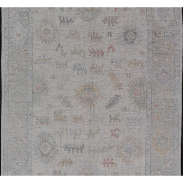 Large Oushak Rug With Floral Motifs & Muted Colorful Tones on Neutral Background For Sale In Atlanta - Image 6 of 12