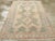 This mid-20th-century Persian Afshar rug presents a softly geometric composition in muted blue-green, pale peach, ivory,...