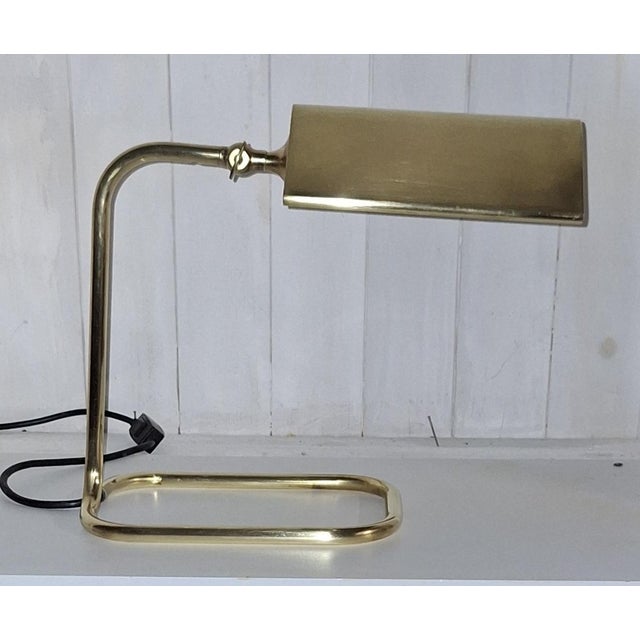 Vintage Adjustable Brass Table Lamp from Florian Schulz, 1980s, in Very Good conditions. Designed 1980 to 1989 I have...