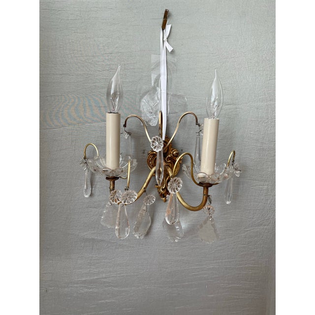 Add glamour to any room with these Vintage Petite French sconces. Solid brass and glass crystals and rosettes make this...