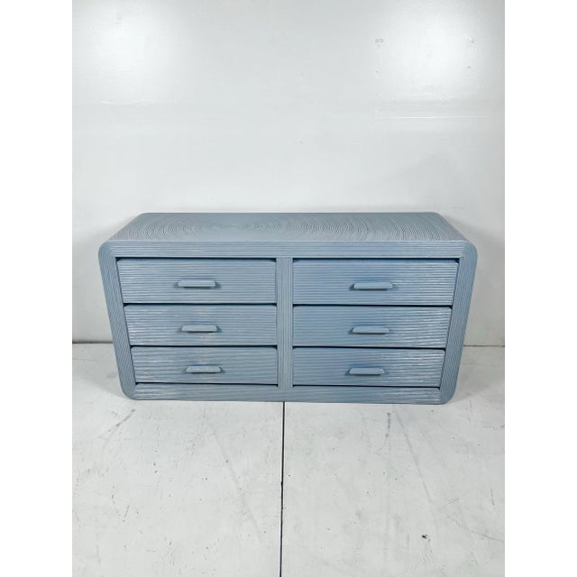 Vintage pencil reed rattan chest of drawers. Newly lacquered in Farrow and Ball's high gloss Parma Grey, a versatile grey...