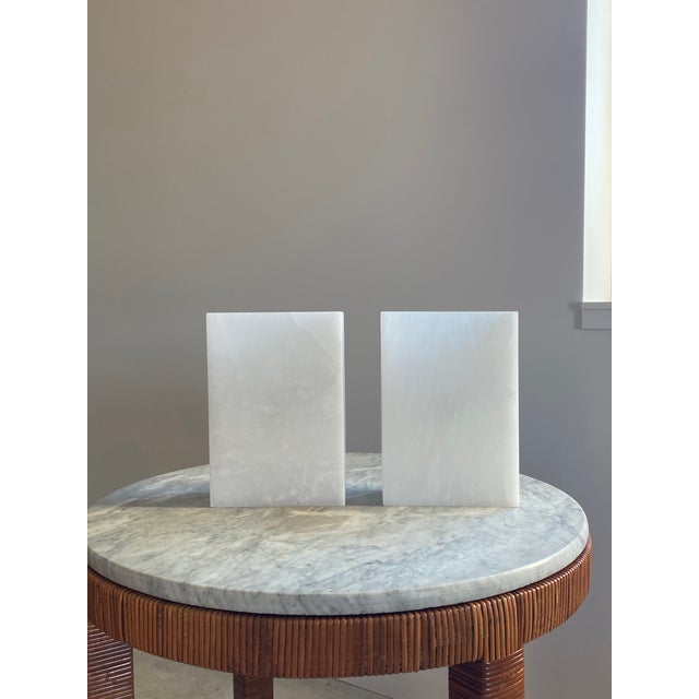 Ultra Minimalist pair of hard-wired sconces in alabaster. Created in Spain, in a clean, über Modernist design, which reads...