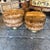 These stunning 1970s Mid-Century Modern poufs, affectionately known as a "Him and Her" set due to their slightly different...