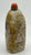 This is a Chinese carved soapstone snuff bottle. The stone shows attractive yellow tan color with cloudy white inclusions,...