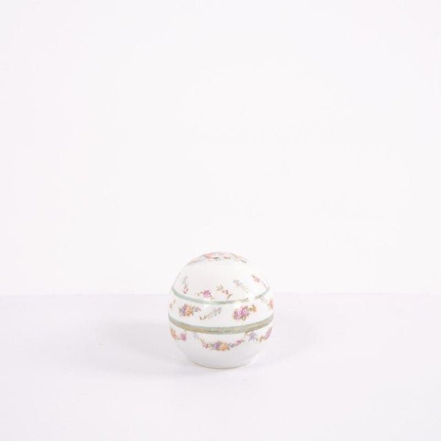 French jewelry box from the 1890s with hand-painted motif on the lid and decorative details. An elegant antique box...