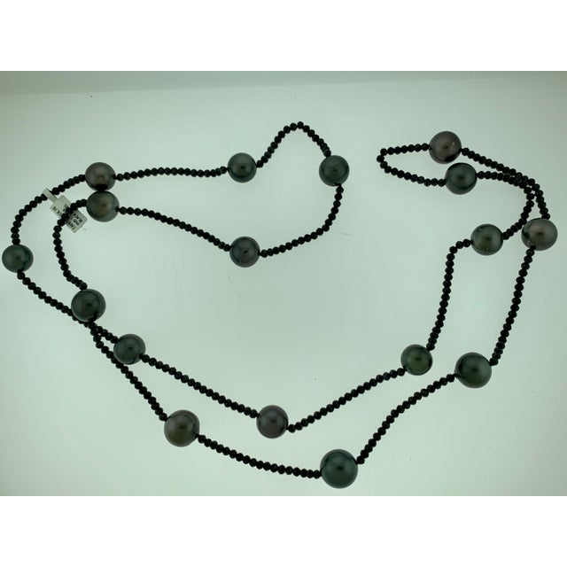 Black Tahitian Pearl Single Strand Necklace with Black Spinel, Opera Length 46 For Sale - Image 13 of 18