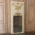 19th Century French Louis XIV Painted Trumeau features classically inspired architecture and elaborate bas relief and...