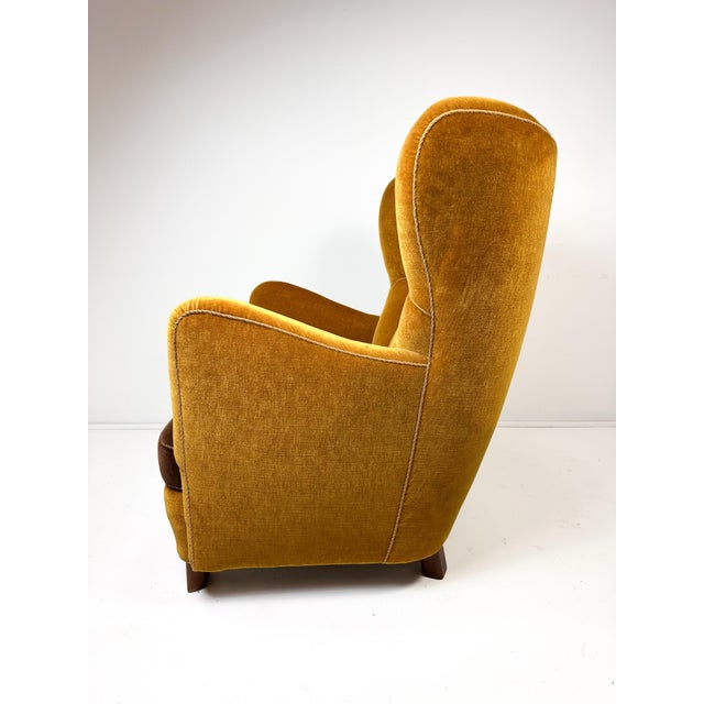 1940's Danish Cabinet Maker High back Lounge Chair. Beech legs. High quality velvet upholstery.