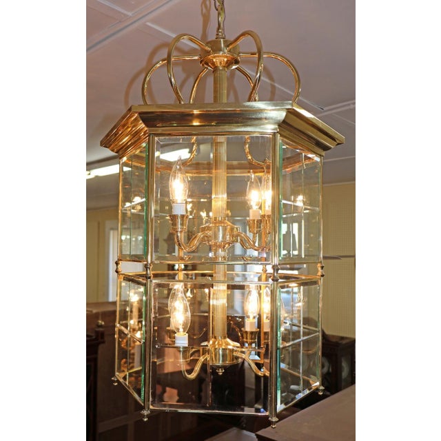 Vintage 8 Light Brass Etched Regency Style Chandelier Lantern Dimensions : 28" Tall X 15" Wide X 15" Deep This gorgeous...