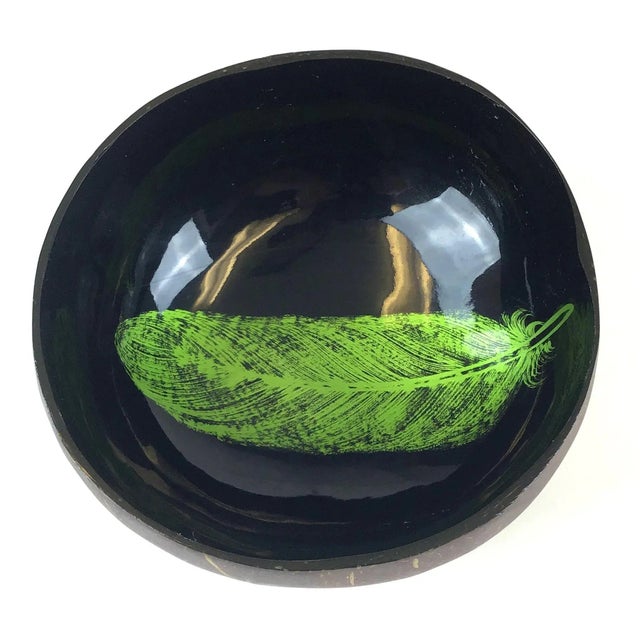 Unique bowl made from a genuine coconut. Inside is black lacquer with a green feather painted detail. Perfect for dry...