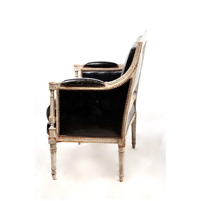 This is a superb pair of Directoire late 18th century or early 19th century Marquis or bergere a la reine. The quality and...